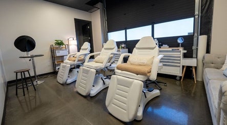 Luxurious treatment chairs in Armor Beauty salon, Knoxville, Tennessee, US, inviting and elegant.