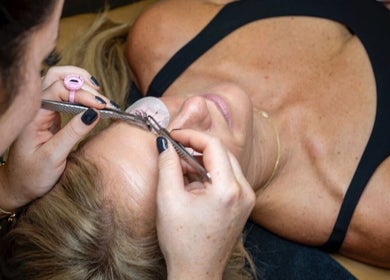 Eyelash extension application at Armor Beauty in Knoxville, Tennessee, US. Enhance your beauty services experience.