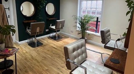 Cozy, modern salon chairs and mirrors at Natural Hair Studio, Horsham, England, GB.