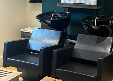 Modern wash station at Natural Hair Studio, Horsham, England, GB offers a sleek and inviting experience.