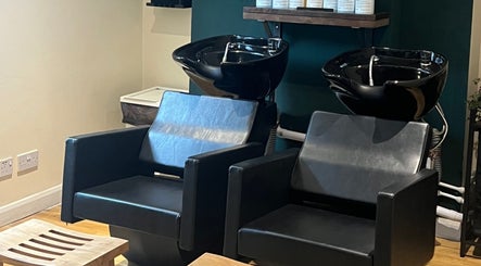 Modern wash station at Natural Hair Studio, Horsham, England, GB offers a sleek and inviting experience.