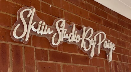 Signage of Skiin Studio by Paige on brick wall in Sydney, New South Wales, AU.