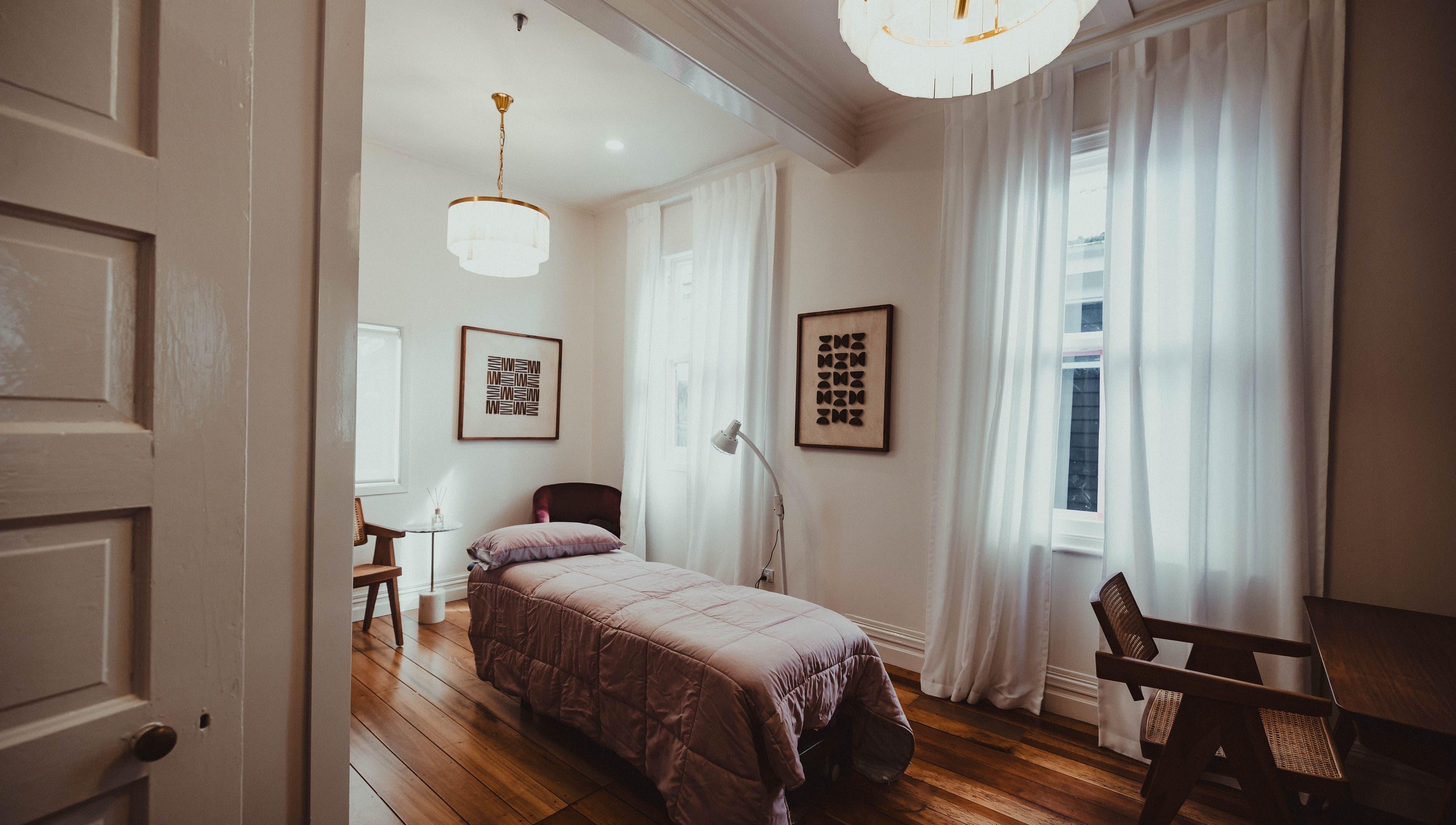 Cozy massage room at WYLD Howick with soft lighting, Auckland, Auckland, NZ.