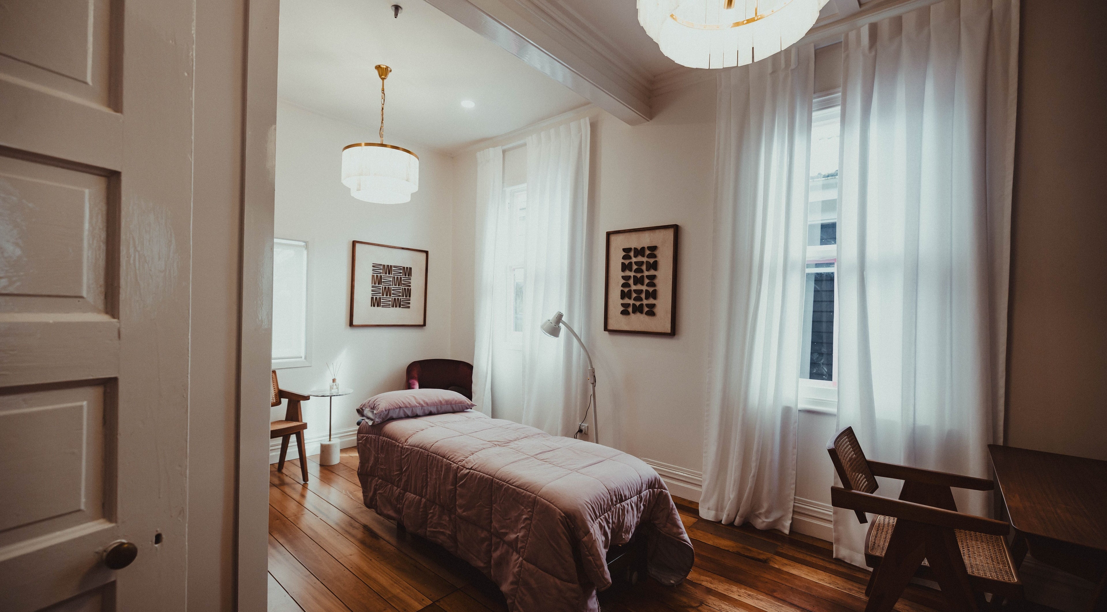 Cozy massage room at WYLD Howick with soft lighting, Auckland, Auckland, NZ.