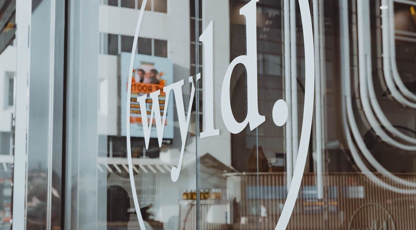 Glass door with WYLD Howick logo at Auckland, Auckland, NZ.