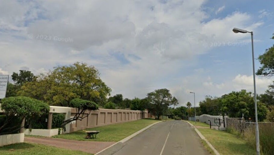 Ozone venue entrance in Roodepoort, Gauteng, ZA with lush greenery and modern architecture.