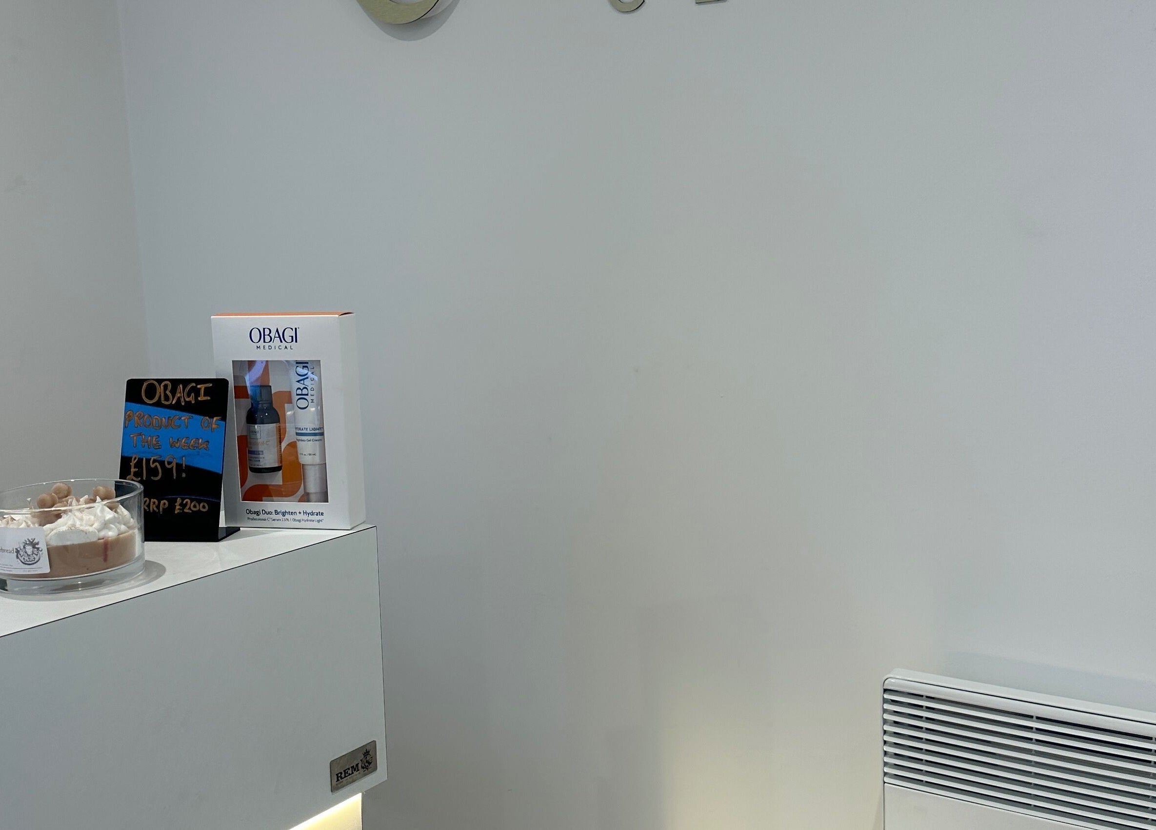 Calm display at Refined Clinic, Baildon, England, GB with skincare product and decor.