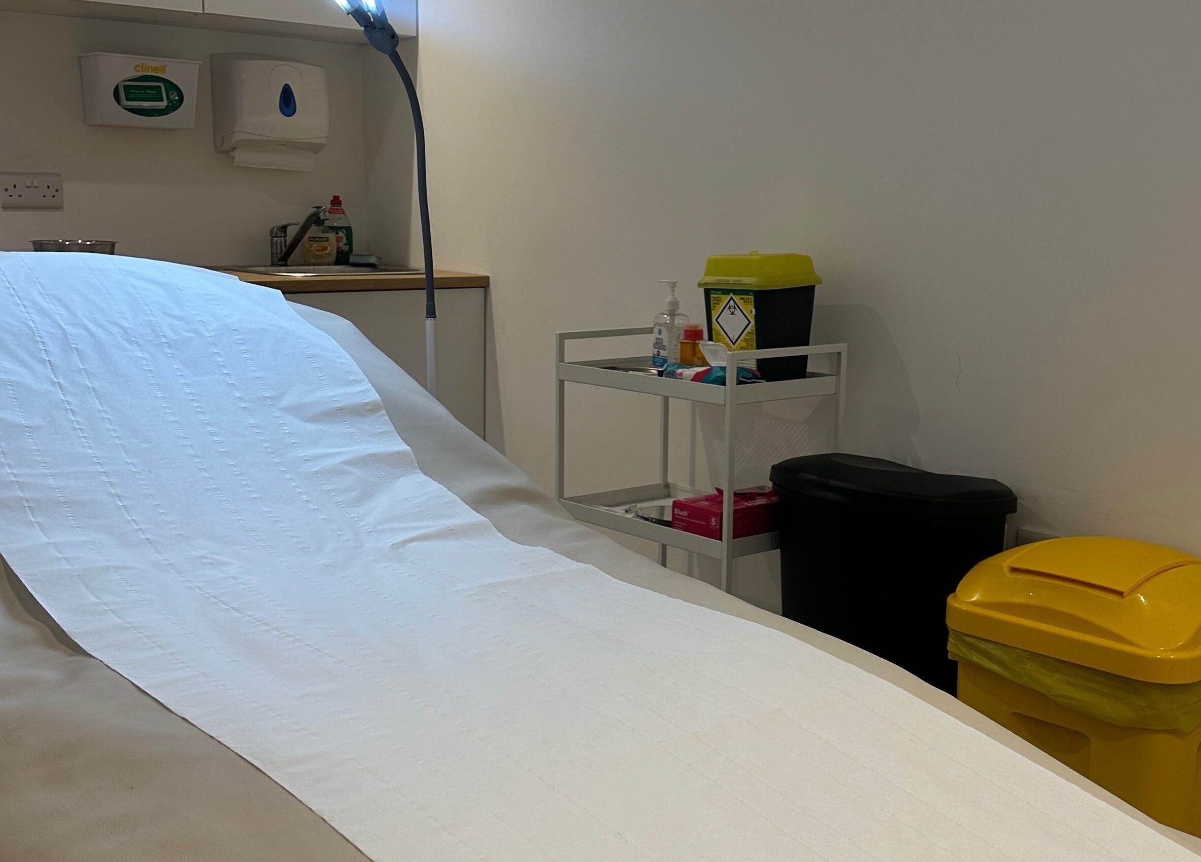 Comfortable treatment room at Refined Clinic, Baildon, England, GB offers a serene wellness experience.