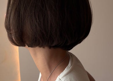 Corte de cabelo moderno no salão Dunia Zayed, São Paulo, São Paulo, BR. Estilo elegante e sofisticado.