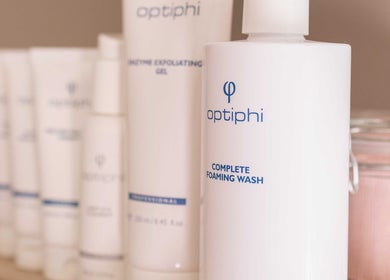 Optiphi skincare products at By Bianca Skin Studio, Waterfall, Kwazulu-natal, ZA, showcasing luxurious beauty care.