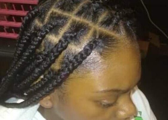 Intricate braided hairstyle at Styles By Nicki in Macon, Georgia, US, showcasing neat and stylish patterns.
