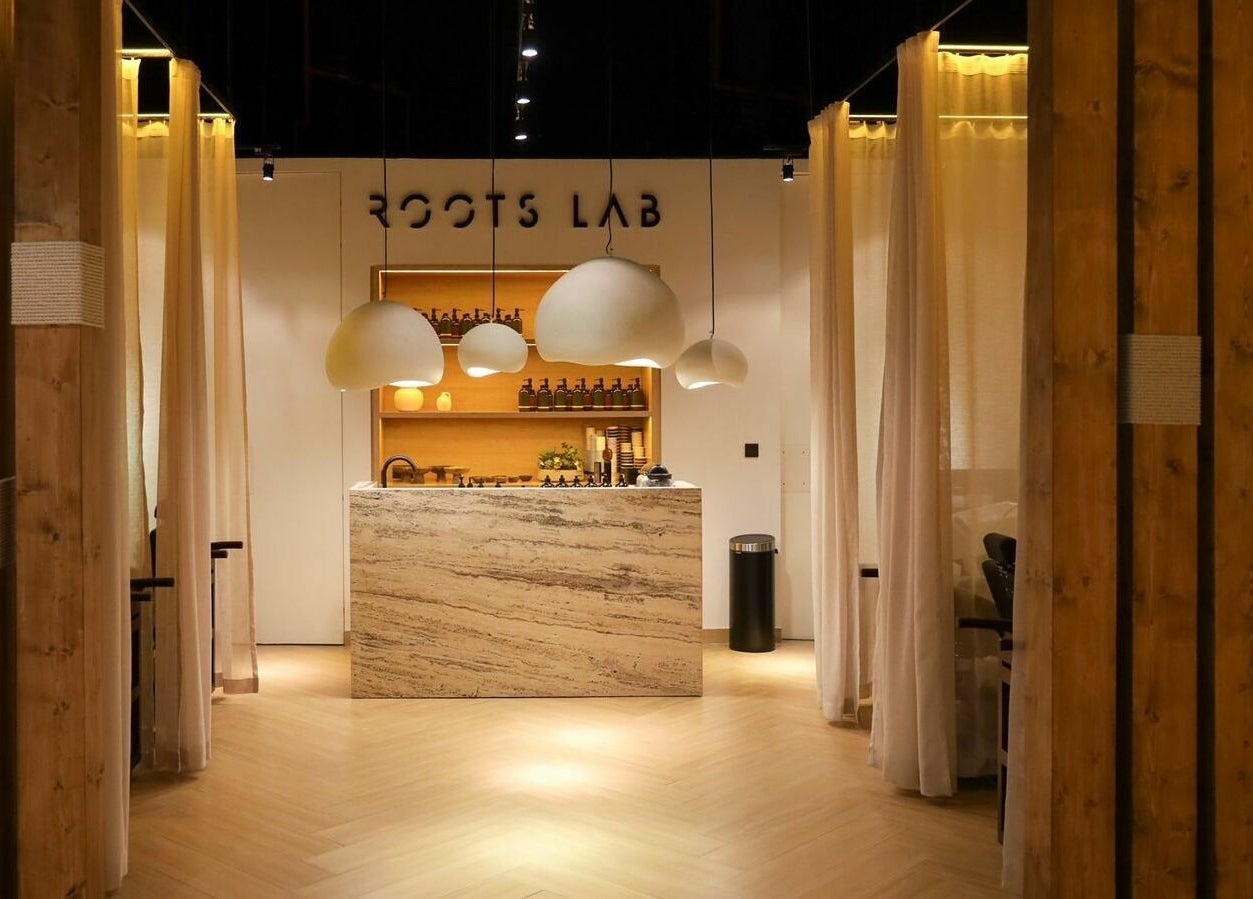 Stylish interior of Roots Lab Beauty Salon in Dubai, AE showcasing modern design and ambiance.