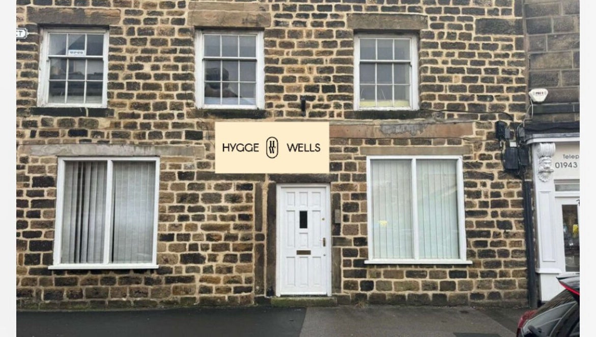 Front view of Hygge Well's cozy stone building in Otley, England, GB.