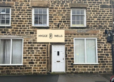 Front view of Hygge Well's cozy stone building in Otley, England, GB.