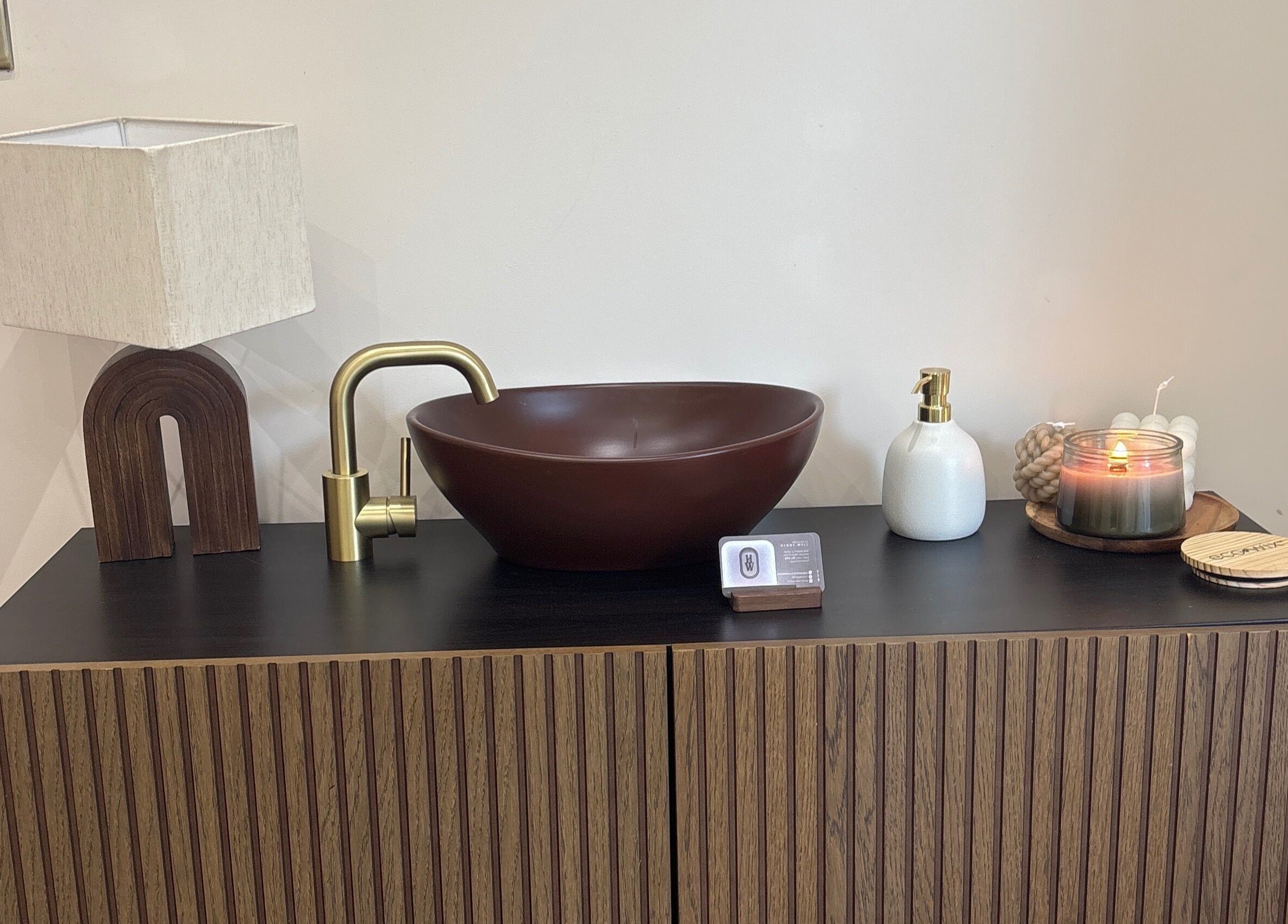 A stylish vanity with brown bowl sink at Hygge Well, Otley, England, GB.