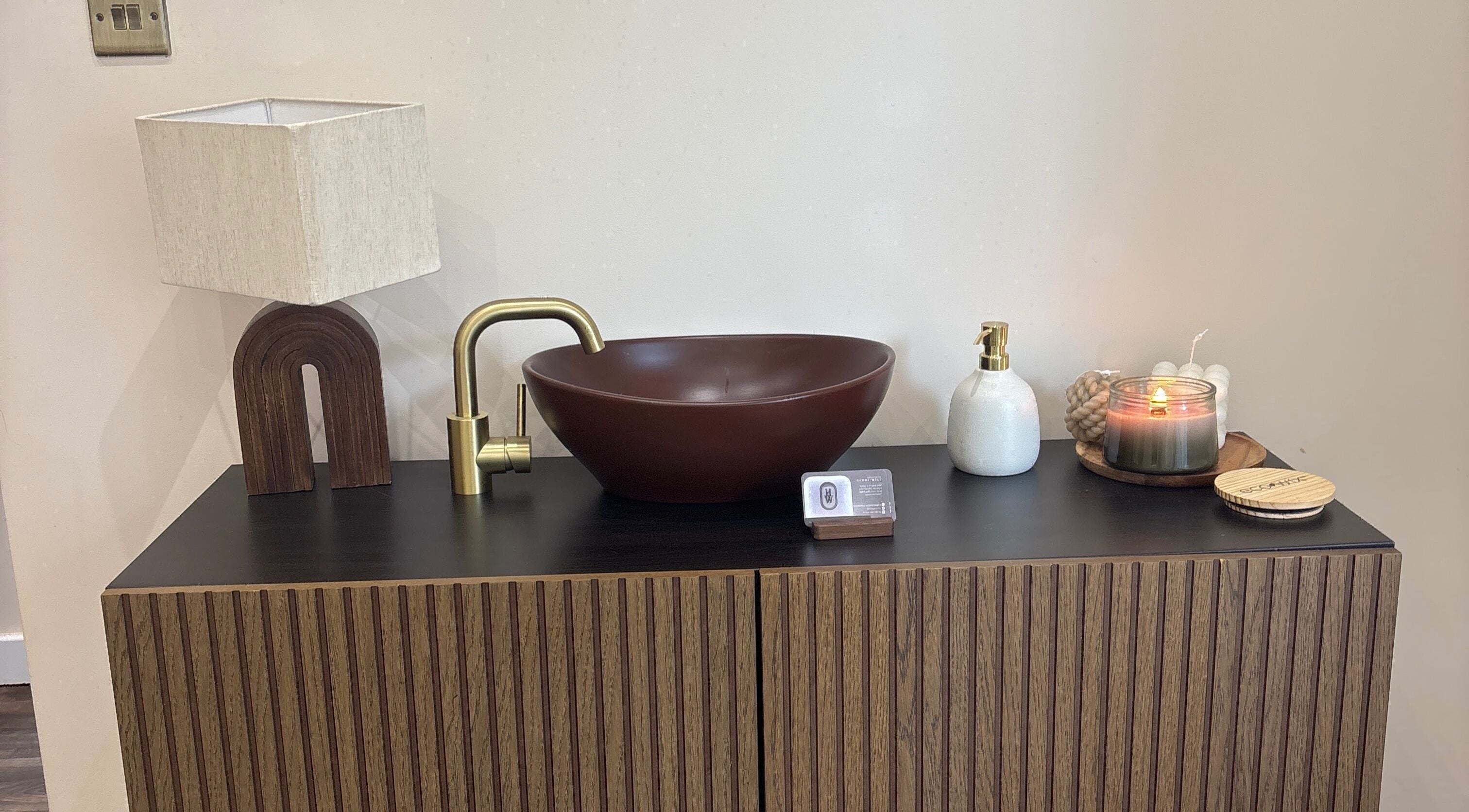 A stylish vanity with brown bowl sink at Hygge Well, Otley, England, GB.