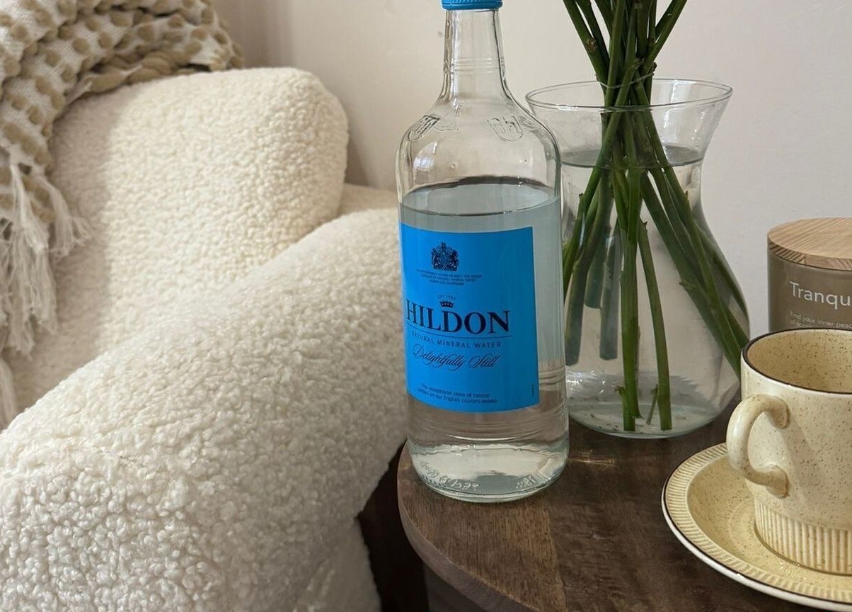 Cozy Hygge Well corner in Otley, England featuring water, vase, and mug for relaxation.