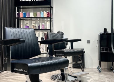 Modern styling chairs at Dalm Beauty Salon in Jeddah, Makkah Province, SA, showcasing sleek, luxurious design.