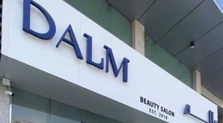 Entrance of Dalm Beauty Salon in Jeddah, Makkah Province, SA featuring modern signage.