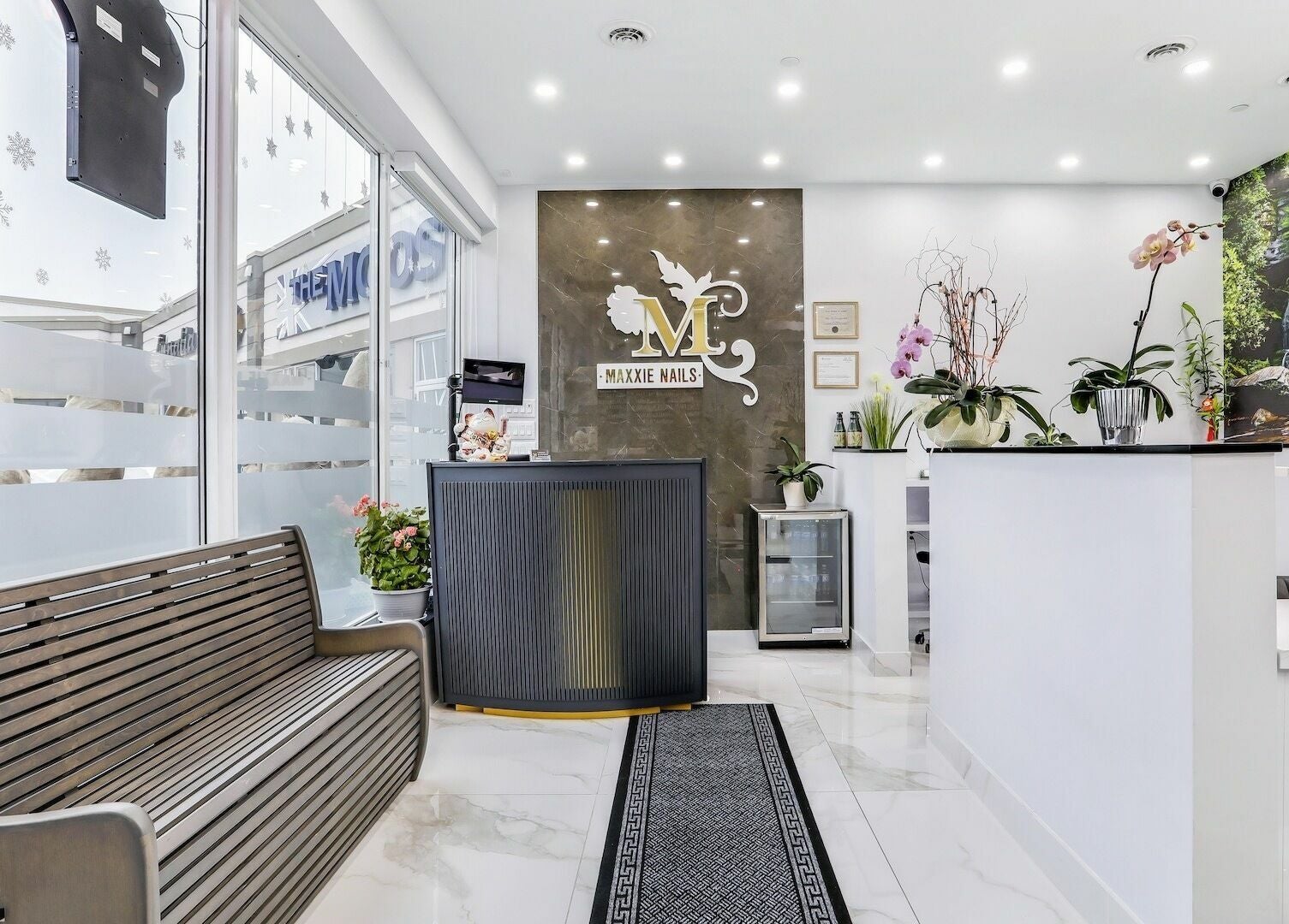 Maxxie Nails' elegant reception area in Vaughan, Ontario, CA, showcasing modern decor and serene ambiance.