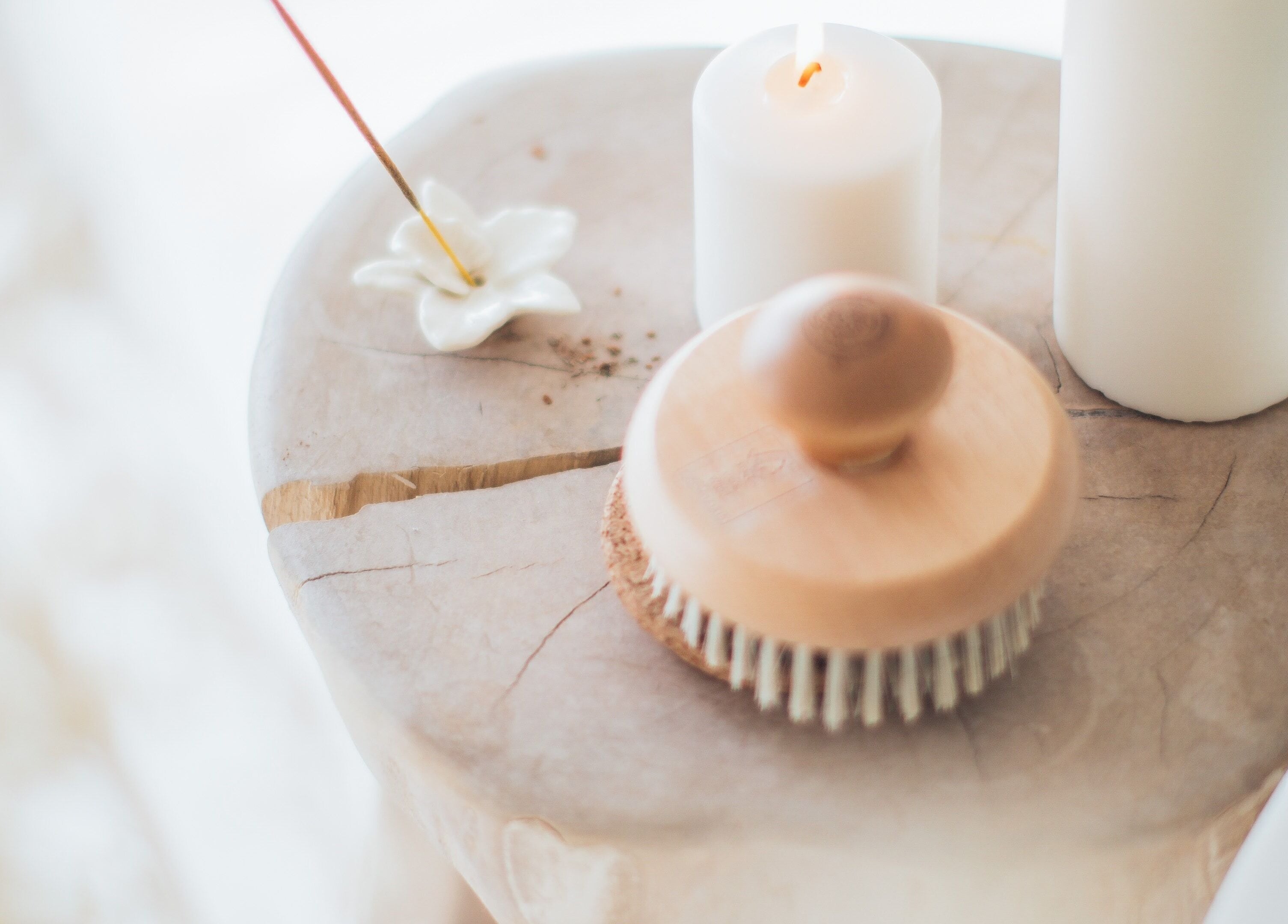 Calming spa setting with brush and candle at Face it Spa, Tsumeb, Oshikoto Region, NA.