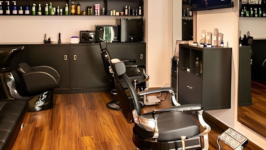 Modern salon interior at Espada, Dhahran, Eastern Province, SA with sleek chairs and product displays.