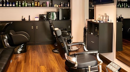 Modern salon interior at Espada, Dhahran, Eastern Province, SA with sleek chairs and product displays.