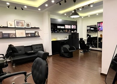 Espada salon interior with stylish decor and modern seating in Dhahran, Eastern Province, SA.