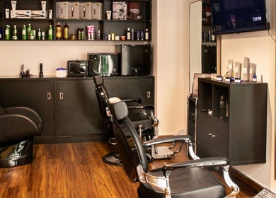 Stylish salon interior at Espada, Dhahran, Eastern Province, SA with modern barber chairs and products.