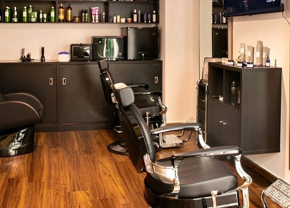 Modern salon seating and products at Espada in Dhahran, Eastern Province, SA, showcasing luxury beauty care.