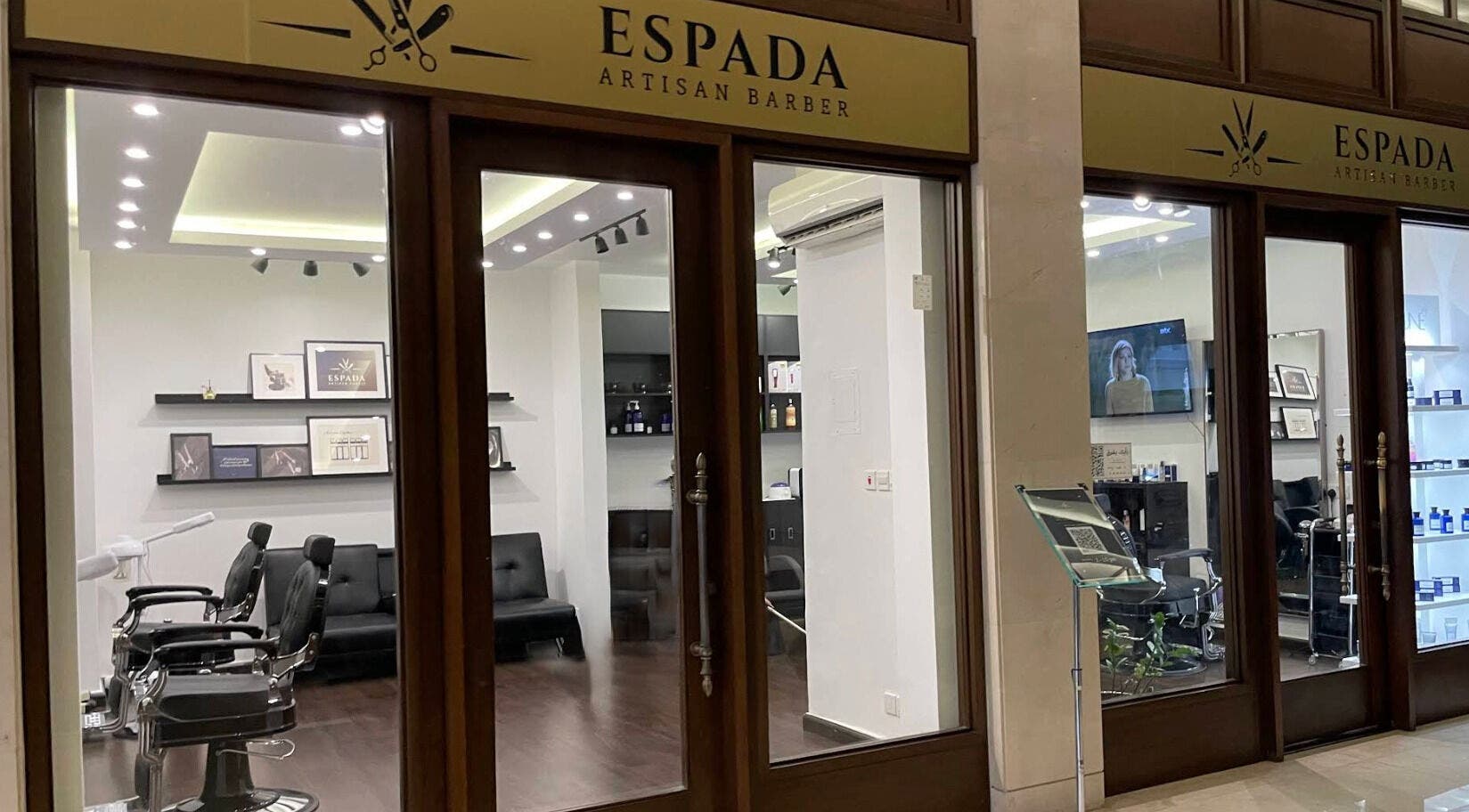 Interior view of Espada salon in Dhahran, Eastern Province, SA showcasing stylish barber chairs and decor.
