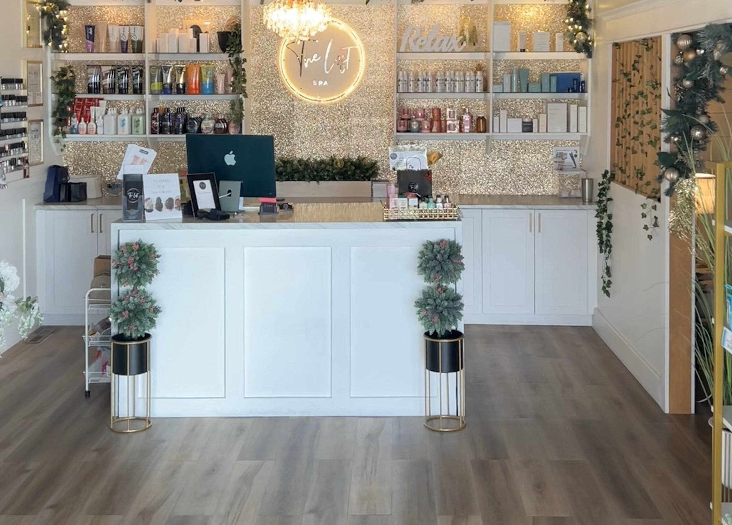 Elegant reception at The Loft Spa, Barrington Passage, Nova Scotia, CA with stylish decor and beauty products.