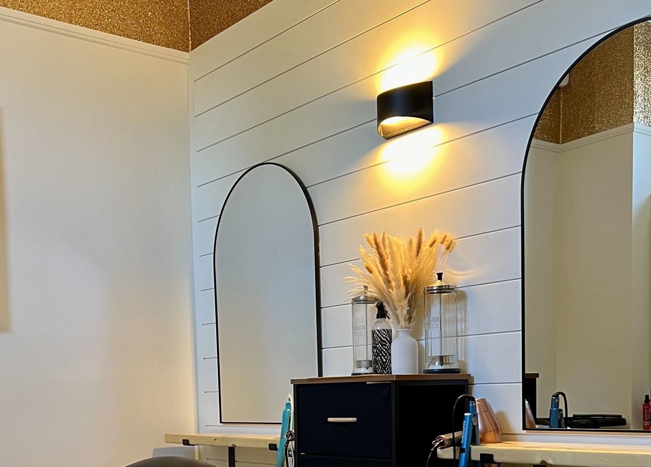 Modern vanity area at The Loft Spa, Barrington Passage, Nova Scotia, CA with stylish decor.