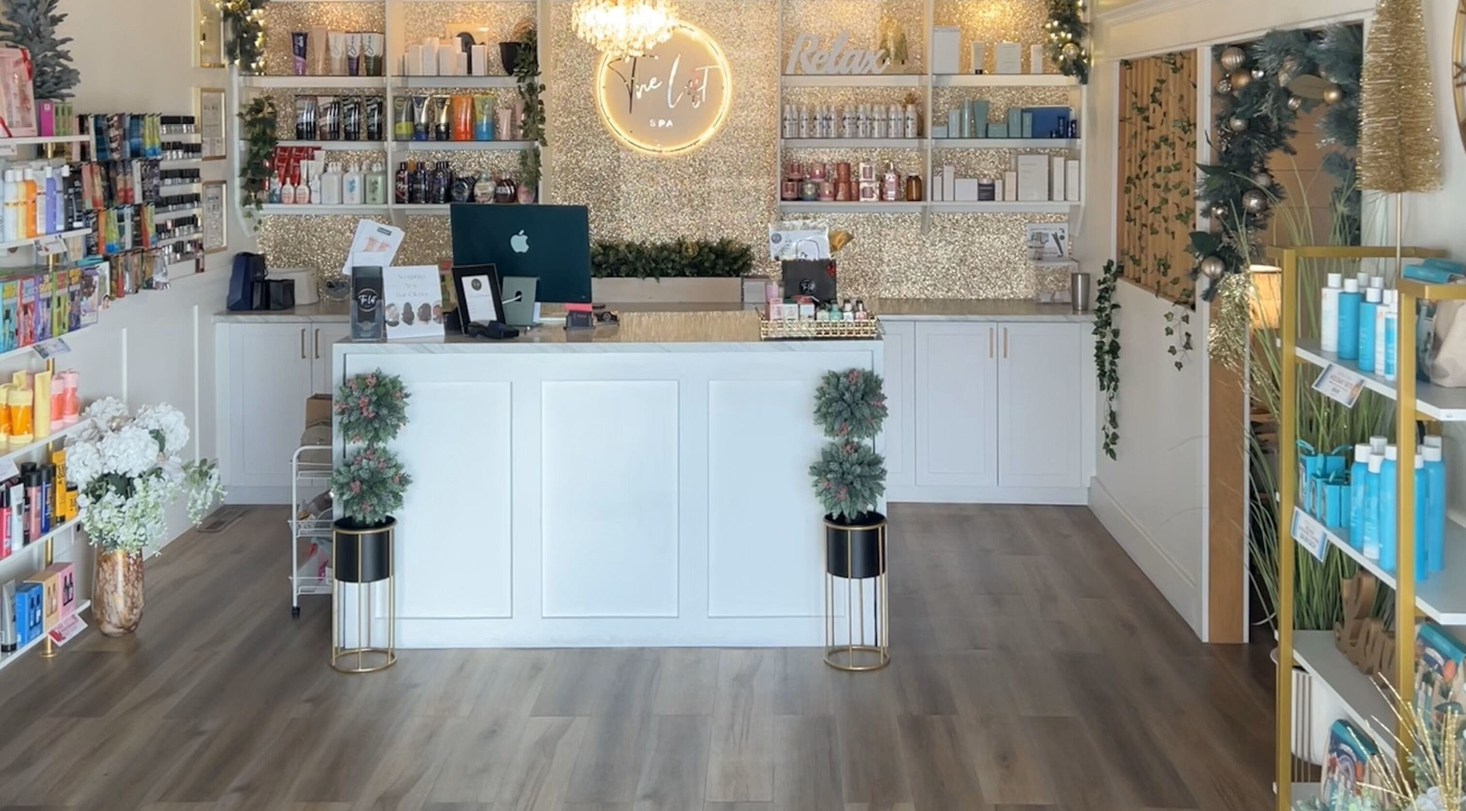 Chic interior of The Loft Spa, Barrington Passage, Nova Scotia, CA, featuring stylish decor and product displays.