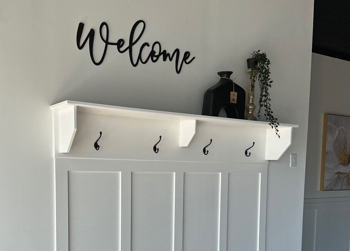 Welcome sign with hooks at The Loft Spa, Barrington Passage, Nova Scotia, CA.