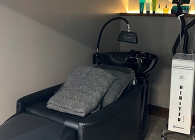 Luxurious hair wash station at CuE Hair Salon Richmond, Richmond, British Columbia, CA for premium relaxation.