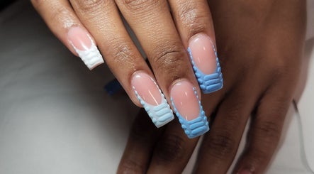 Close-up of a chic blue and white nail design from Mimisnailbar, Ilford, England, GB.