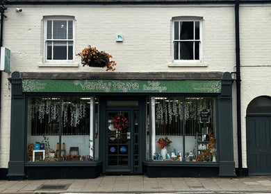 Front of Vanity Fayre beauty venue on Donington's High Street, England, showcasing elegant decor and display.
