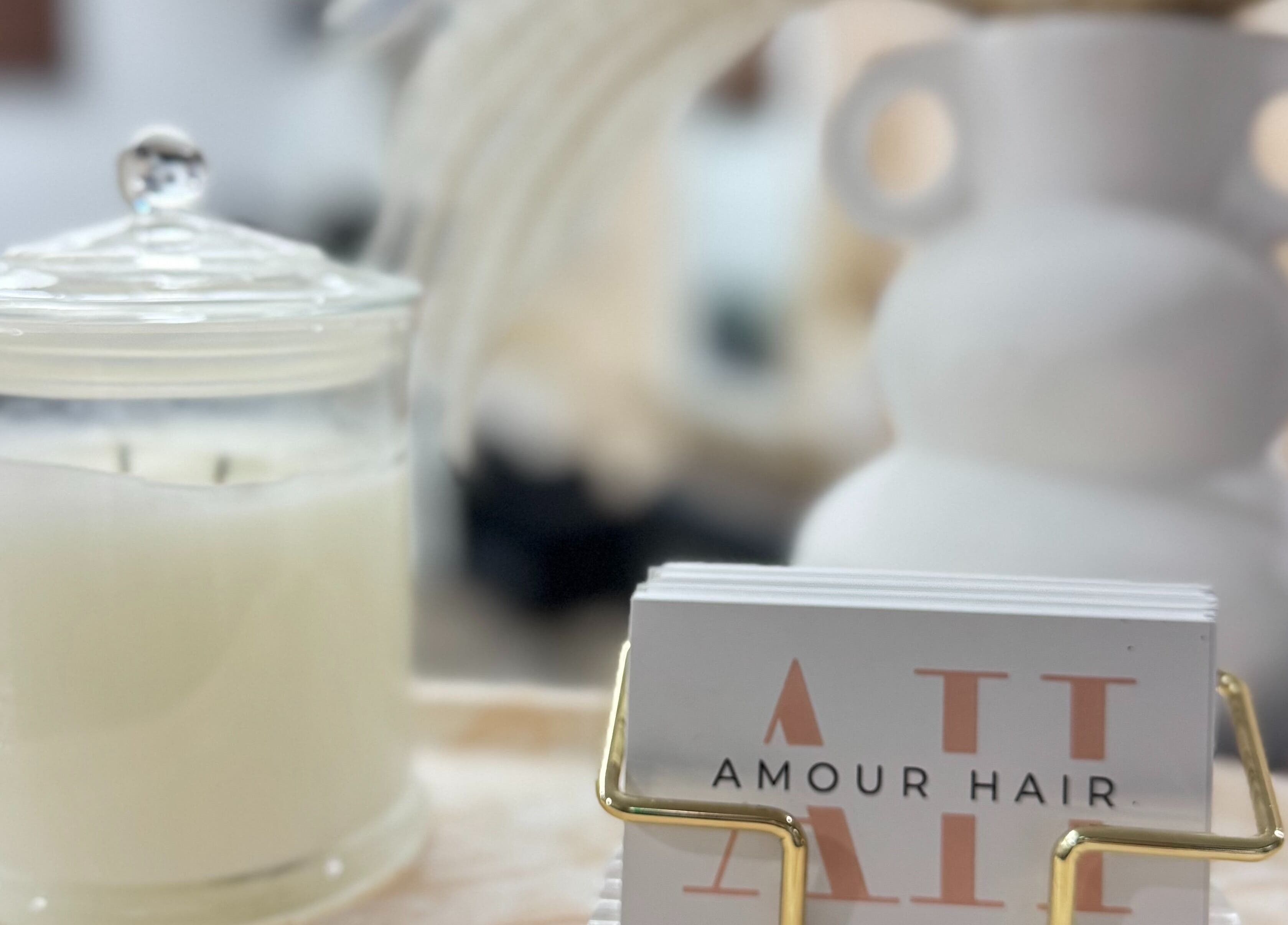 Elegant candle and business card display at Amour Hair, Wyong, New South Wales, AU.
