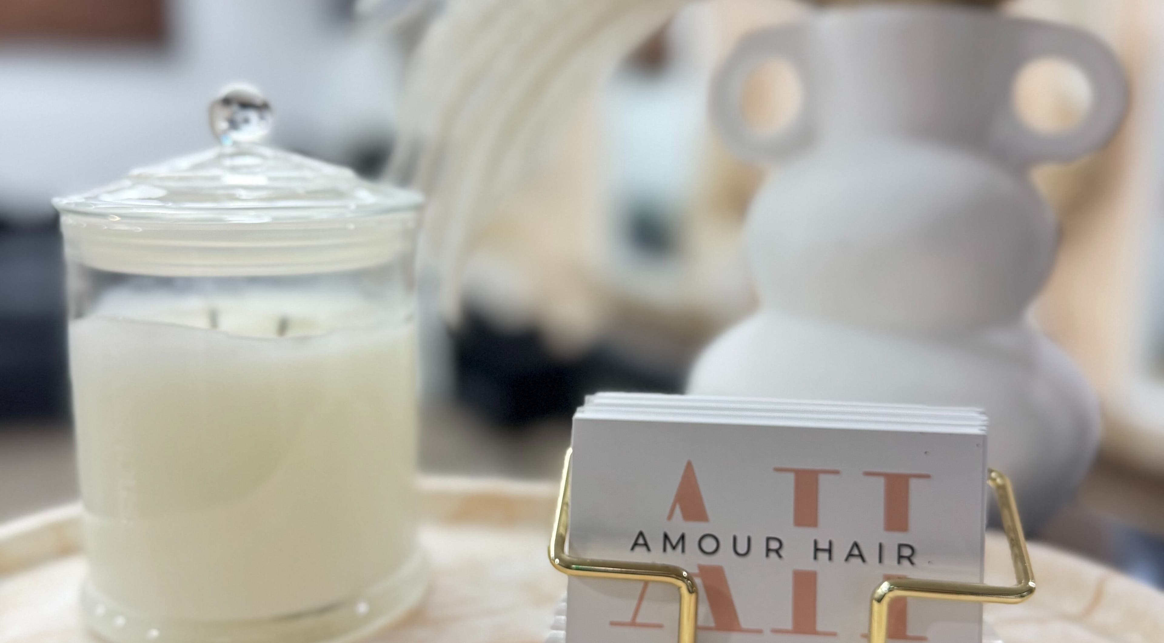 Elegant candle and business card display at Amour Hair, Wyong, New South Wales, AU.