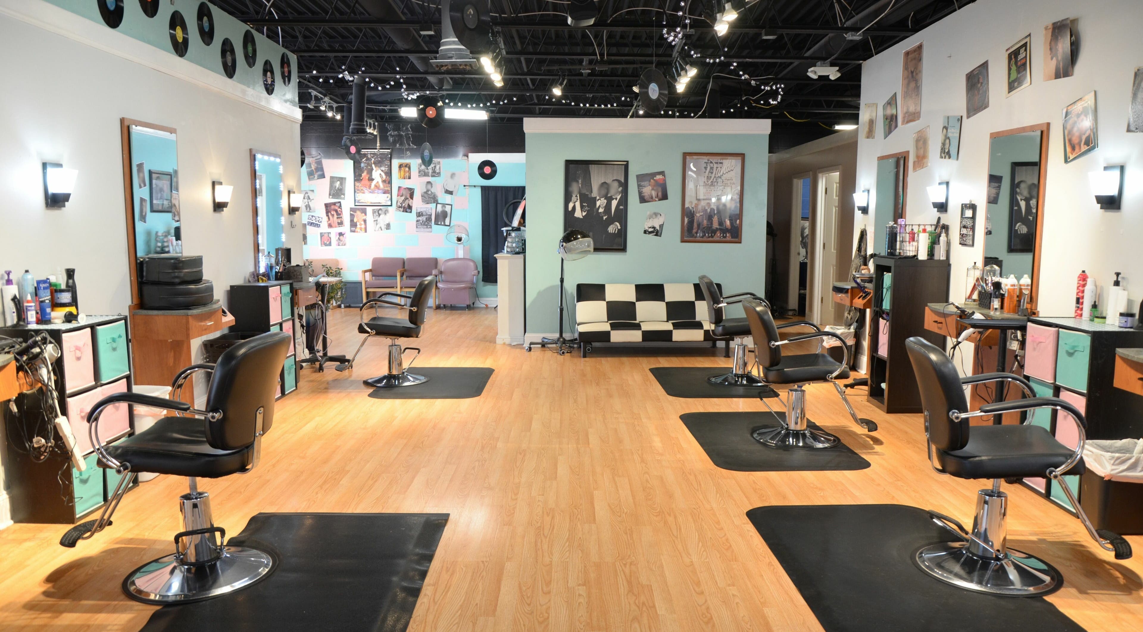 Modern salon chairs and decor at Shear Maddness Hair Salon, Salem, Virginia, US.