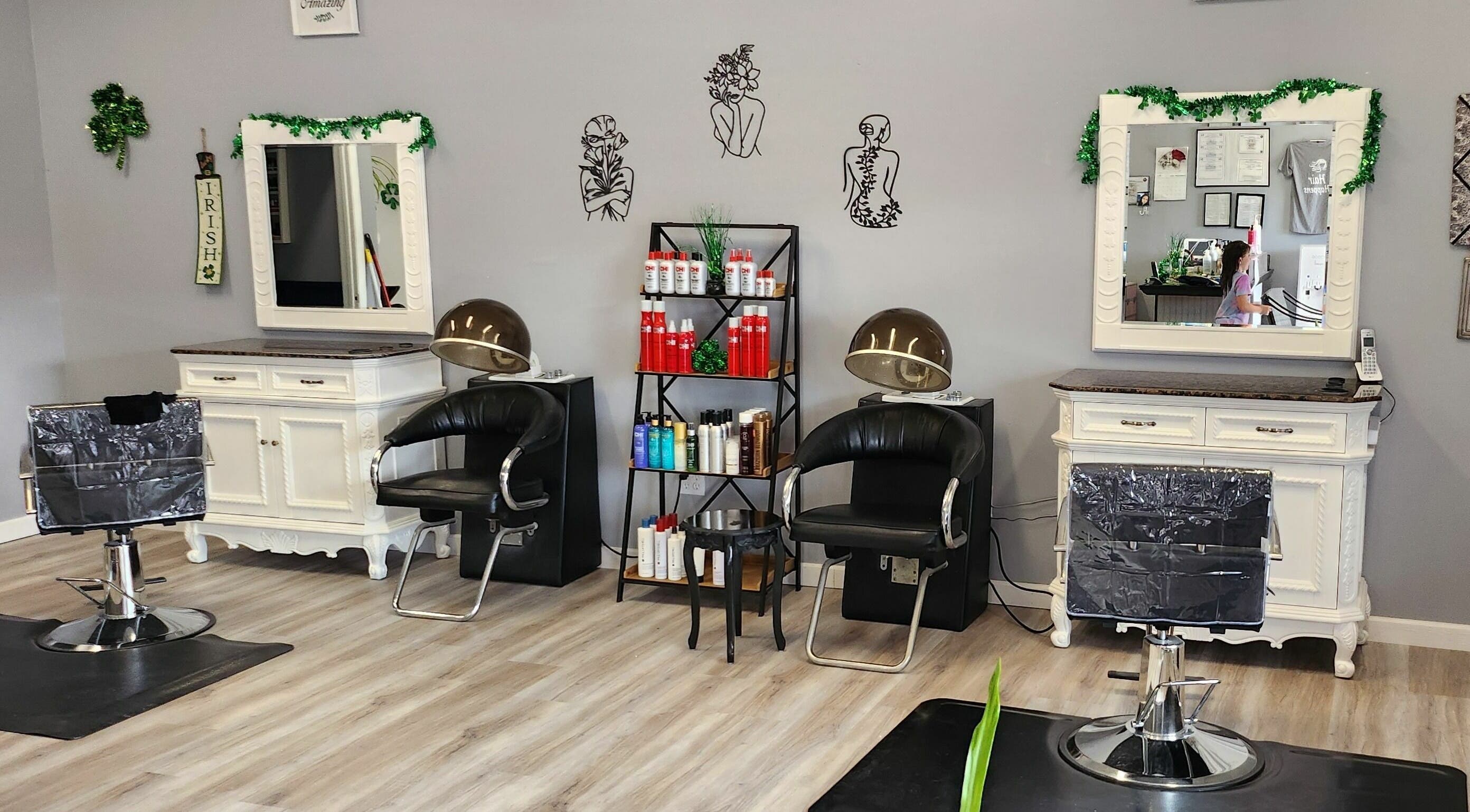 Interior of Hair Happens llc, a stylish salon in Edgewater, Florida, US. Features chic chairs and mirrors.