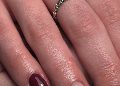 Elegant red manicure at Sophie Victoria Nails in Frome, England, GB, showcasing expert nail art.