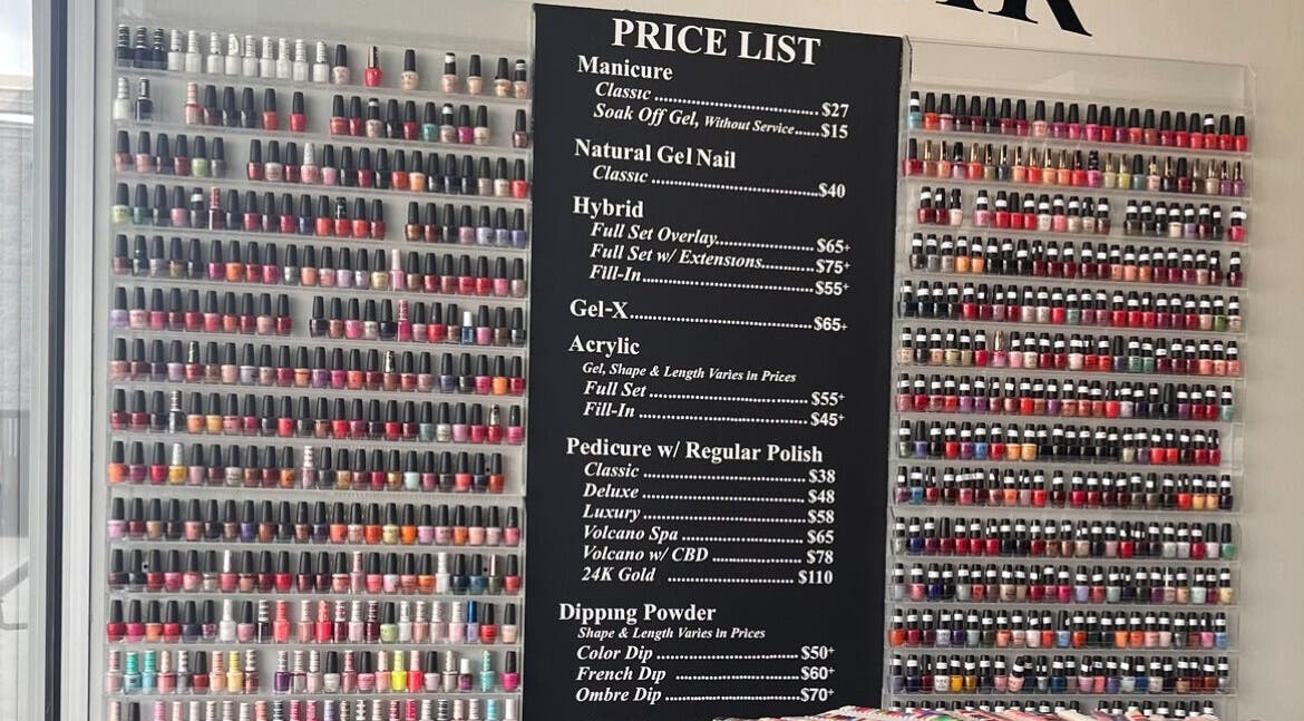 Nail polish display and price list at Nail Bar of Carmel, Carmel, Indiana, US.