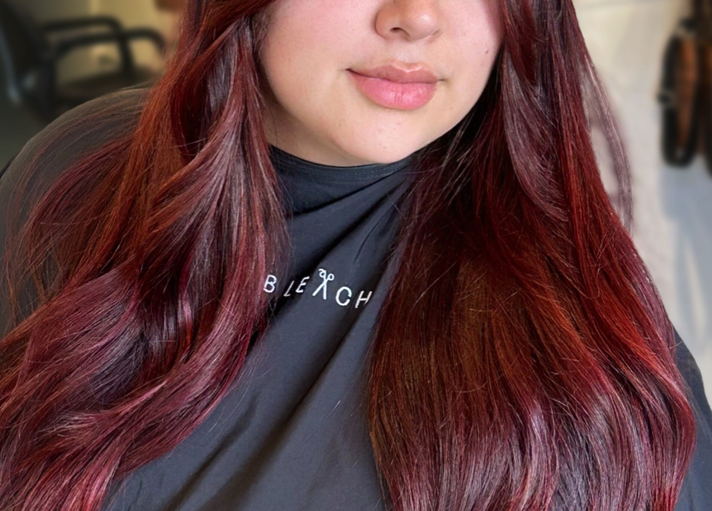 Stylish auburn hair styled at Styled By Elicia in West Covina, California, US, showcasing vibrant color.