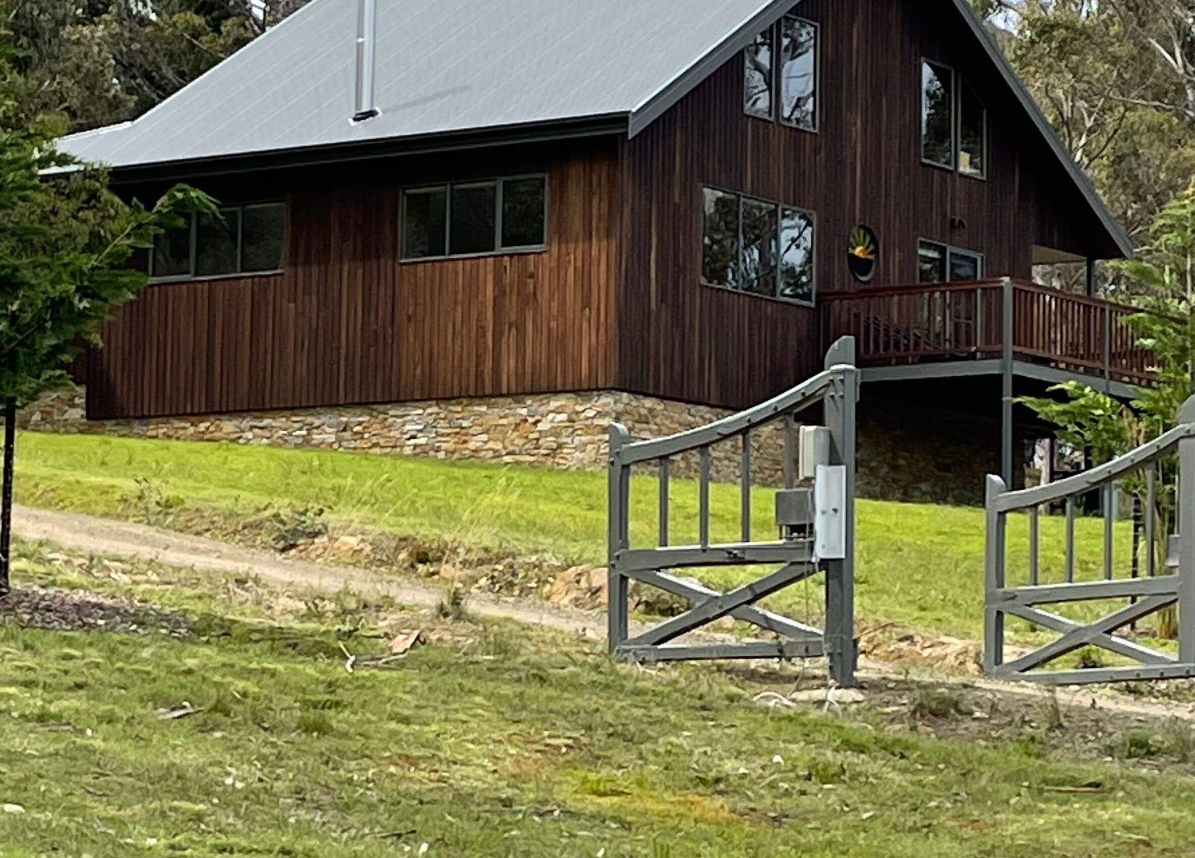 Charming wooden venue Relax & Bloom in Kettering, Tasmania, AU, amid lush greenery and tranquil surroundings.