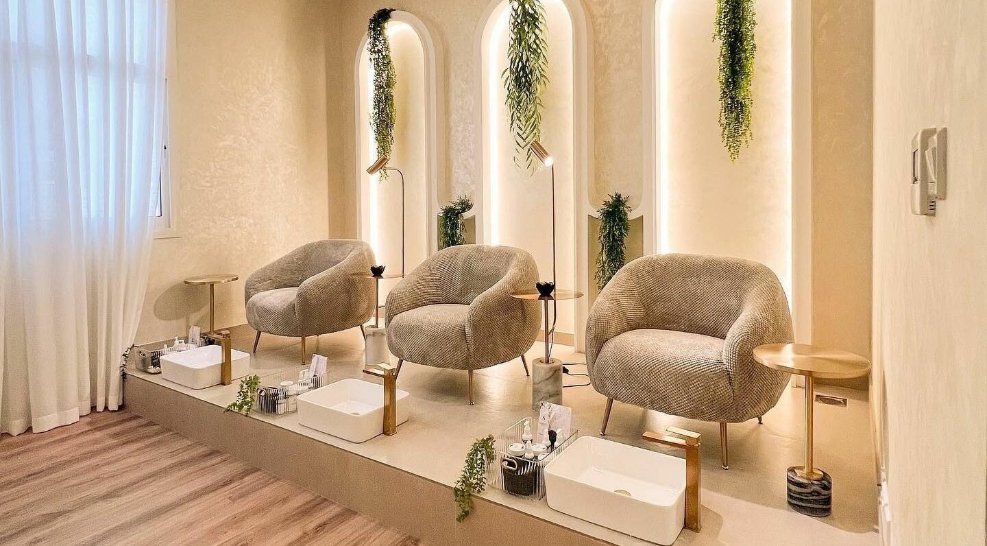 Chic pedicure lounge at Serenity Room Ladies Salon, Abu Dhabi, with plush seating and soft lighting for relaxation.
