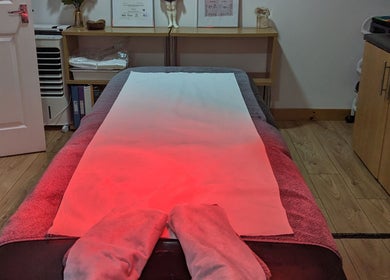 Massage therapy table at Level up Massage, Fareham, England, GB with tranquil lighting and soothing ambiance.