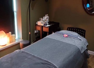 Relaxing therapy room at The Escape Beauty Rooms, Abertillery, Wales, GB with ambient lighting and serene decor.