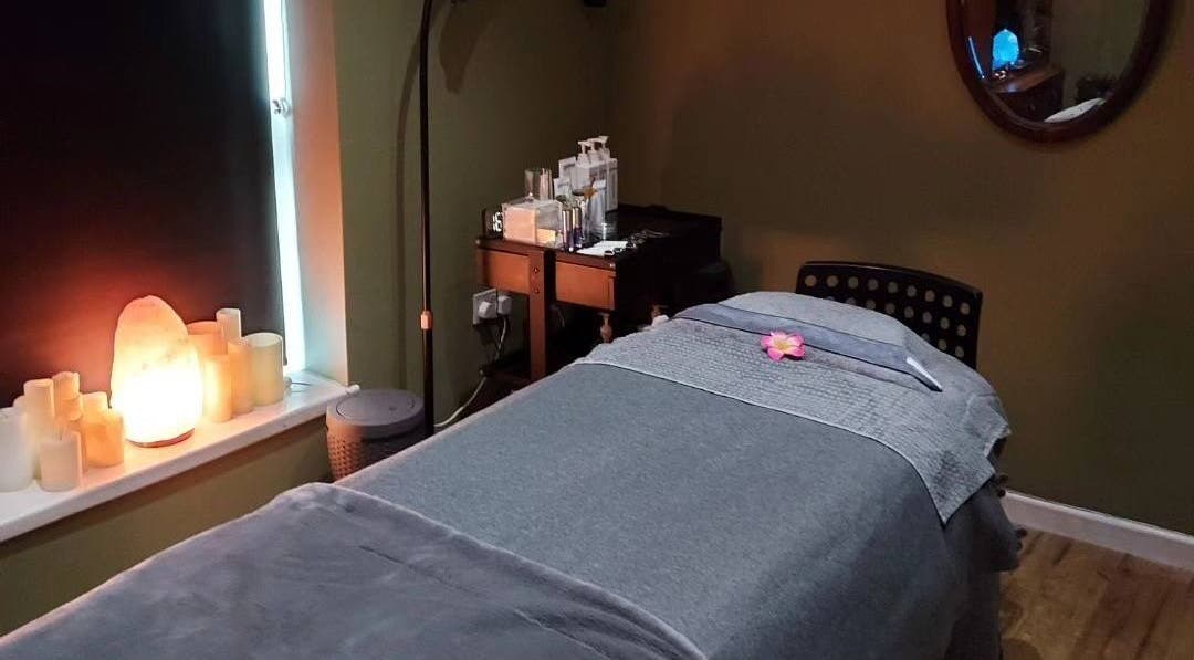 Relaxing therapy room at The Escape Beauty Rooms, Abertillery, Wales, GB with ambient lighting and serene decor.